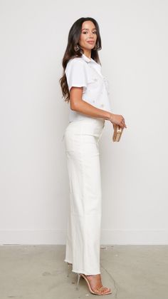 Elevate your casual look with these white wide leg pants. The sleek white hue adds versatility, allowing for easy pairing with both casual tees or dressier tops for a chic ensemble. With their smooth satin finish, these pants offer a perfect balance of style and practicality for any occasion. Features: White Wide Leg Pants 81544 P2-2-2 Chic Off White Cotton Wide Leg Pants, White Relaxed Fit Wide Leg Pants For Work, Chic White Wide Leg Pants For Work, White Ankle-length Wide Leg Pants For Work, White Cotton Wide Leg Pants For Day Out, Chic Cream Wide Leg Pants, White High Waist Wide Leg Work Pants, Versatile White Pants For Spring, Off White Wide Leg Pants For Spring Workwear