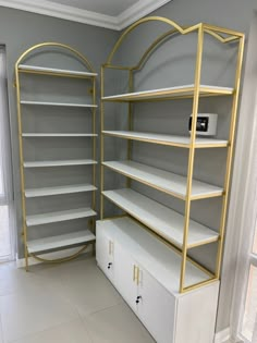 an empty room with shelving and shelves in it