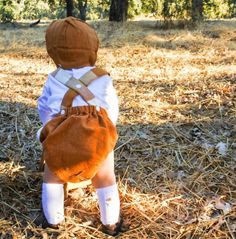 "Baby Suspender Bloomers in 100% Cotton with Removable Straps DETAILS -100% Cotton Heavy Flannel Fabric -Suspender Bloomers -Adjustable Straps or Fixed Straps (Only Recommended up to 6 Months) -Traditional Style, Straps are Removable  -Flannel Bloomers in Pumpkin with Pumpkin Plaid Straps -Perfect for Thanksgiving and Fall Pictures -Pair with tights or leggings and a bodysuit in cooler months -Please Reference Size Chart in Photos -Please contact me with any questions about sizes. CARE -100% Cotton -Machine Washable -Hang to Dry SHIPPING -Will Ship Within 1-3 Business Days -We use USPS Shipping Services Matching Suspender Skirt for Sister: https://www.etsy.com/shop/GentleMeadows?ref=simple-shop-header-name&listing_id=753350930&section_id=40336095 I'm \"Gigi\", Grandma to five adorable babe Toddler Thanksgiving Outfit, Gigi Grandma, Toddler Thanksgiving, Baby Suspenders, Girls In Suspenders, Hat For Baby, First Birthday Outfit, Toddler Romper, Baby Bloomers