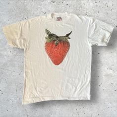 Strawberry Graphic Tee - Fresh Fruit-Inspired Casual Fashion Add a touch of freshness to your wardrobe with this tee featuring a bold strawberry graphic. Ideal for those who love fruity and fun designs. 👕 Material: 100% Cotton 🎨 Design: Bold Strawberry Graphic 📏 Sizes: M-3XL ⏳ Custom Creation Time: Please allow 1-2 weeks for production. #StrawberryTee #FruitFashion #GraphicTshirt #CasualWear #CustomApparel #UniqueFashion T Shirt Sleeve Design, White T-shirt With Fruit Design For Spring, White Relaxed Fit T-shirt With Strawberry Print, Cotton T-shirt With Strawberry Print, Cotton Short Sleeve T-shirt With Strawberry Print, White T-shirt With Strawberry Print For Spring, Casual White Tops With Fruit Design, White Casual Top With Fruit Design, Casual White Top With Fruit Design