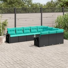 an outdoor patio furniture set with blue cushions