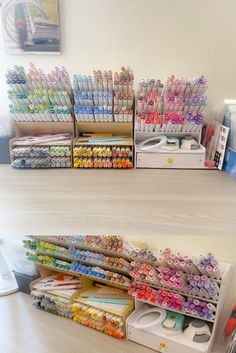 there are many craft supplies on display in the store