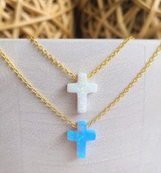 Blue or White Opal Cross Necklace, Silver Opal Cross Choker Necklace for Women, Opal Cross Pendant Girl, First Communion, Confirmation Gift This is a dainty Blue or White lab Opal Cross Necklace (made from natural Opal powder). The chain is solid 925 Sterling Silver, you can choose between Cable Chain or Box Chain. You can see my complete Collection of Opal Necklaces at the following link: https://www.etsy.com/shop/OpalPalace?section_id=34964169 -------------------------------------------------- Blue Cross Necklace As Gift, Adjustable Blue Cross Necklace, Blue Adjustable Cross Necklace, Opal Necklaces, Cross Choker Necklace, Cross Choker, White Lab, Confirmation Gifts, Opal Necklace