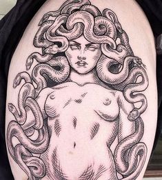 a woman with an octopus tattoo on her arm and chest is shown in black ink