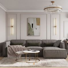 a living room filled with furniture and a chandelier