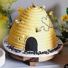 a cake that is shaped like a beehive