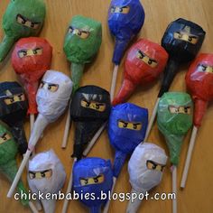 several lollipops with ninja masks on them