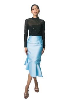 An exquisite piece for the modern woman, the Emilia Skirt radiates with a classic style. Defy the traditional norms with its irregular-designed pencil cut and make a statement on days where you want to express both your bold personality and savvy business sense. Available in Black, Beige, Blush, Ice Blue & Navy, the Emilia Skirt is a versatile piece that can be dressed up or down. Available in Black, Beige, Blush, Ice Blue & Navy Features a ruffled design and an irregular cut for that extra bit Spring Evening Draped Midi Skirt, Spring Lined Draped Pencil Skirt, Elegant Cocktail Skirt With Ruffled Detail, Evening Silk Ruffled Skirt, Silk Ruffled Skirt For Evening, Spring Evening Draped Lined Skirt, Chic Evening Draped Pencil Skirt, Elegant Blue Asymmetrical Skirt, Silk Asymmetrical Skirt For Night Out