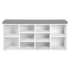 a white shelf with several shelves and a gray cushion on top, against a white background