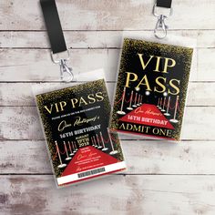 two black and gold party passes with red cake on them, attached to a white wooden background