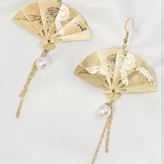 Gorgeous Fashion Gold Tone Color Oriental Fan Earrings. Has Small Pearl Accent. Hook Back. New ****Fashion / Costume Jewelry **** Ships Out Same Or Next Day Bundle 3 Or More Items For Discount & Free Shipping Thank You For Viewing My Listing Elegant Clip-on Teardrop Party Earrings, Elegant Fish-shaped Formal Jewelry, Elegant Gold Coin-shaped Earrings, Jinafire Long, Elegant Gold Fish-shaped Earrings, Simple Aesthetic, Fan Earrings, Fashion Costume, Small Earrings