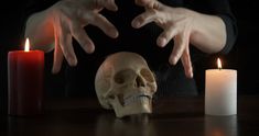 Spells over the skull. Tense female hands over the skull and burning candles at night. Summoning Spirits, Candle In The Dark, Break Up Spells, Spells For Beginners, Black Magic Removal, Black Magic Spells, Bring Back Lost Lover, Spell Cast, Love Spell Caster