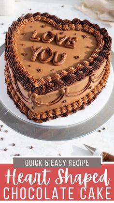 a heart shaped chocolate cake on a plate with the words, quick and easy recipe