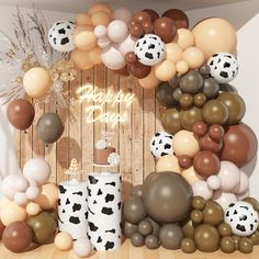 an image of a birthday party with balloons and decorations in the shape of cow's heads