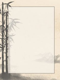 a bamboo tree with an empty white paper in the foreground and mountains in the background