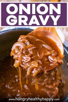 a wooden spoon full of onion gravy