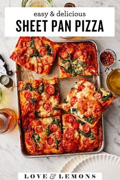 the cover of easy and delicious sheet pan pizza is shown on a table with plates, glasses