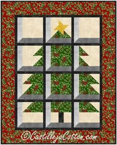 a quilted christmas tree is shown through the window