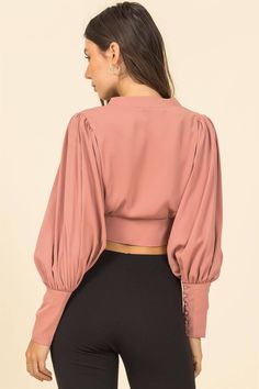 100% polyester Model is 5' 8", 32' chest, 24' waist and 34' hips and wearing a size small. Available in black or pink. Feminine Puff Sleeve Tops For Night Out, Fitted Feminine Solid Blouse, Pink Crop Top For Night Out In Fall, Fitted Blouson Sleeve Party Tops, Non-stretch Crop Top For Night Out In Fall, Pink Bishop Sleeve Blouse For Fall, Chic Fitted Blouse In Solid Color, Pink Cropped Top For Fall, Pink Fitted Top For Fall