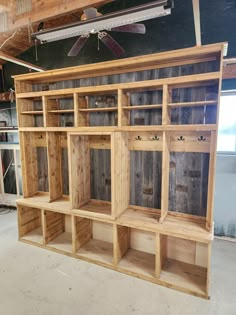 the shelves are made out of wooden boards