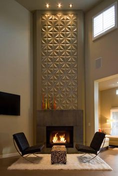 a living room filled with furniture and a fire place in the middle of the room