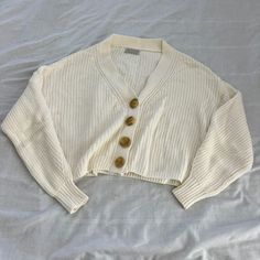 Urban Outfitters Knit Cardigan Size Small Condition: Nwot Color: Ivory Details : - Button-Down - Perfect On Its Own Or For Layering Extra: - I Ship Between 1-2 Days Cream Knit Button-up Cardigan, White Knitted Button-up Outerwear, White Cotton Cardigan With Button Closure, White V-neck Sweater With Buttons, Cream Cotton Button-up Cardigan, Beige Cotton Sweater With Buttons, Cream Cotton Cardigan With Buttons, White V-neck Cardigan With Buttons, Cream Cotton Sweater With Button Closure