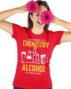 a woman holding two pink flowers in front of her face with the words, according to chemistry alcohol is a solution