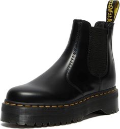 PRICES MAY VARY. The Chelsea: A slick, kickass look with a sure fit and easy-on, easy-off style; Made with classic Dr. Martens leather, visible stitching, grooved sides and heel-loop; Features an aggressive, 1 1/2 inch platform sole Air-cushioned: Dr. Martens famous “bouncing” AirWair soles are comfortable, oil and fat resistant and provide good abrasion and slip resistance Made like no other: Boots built to pound the pavement; The leather upper and sole are heat-sealed together for exceptional Dr Martens Quad, Dr Martens Chelsea Boots, 2976 Chelsea Boots, Dr Martens Womens, Doc Martens Boots, Visible Stitching, Black Platform Boots, Chelsea Boots Women, Black Polish