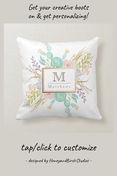 a white pillow with a floral monogrammed design and the words, get your creative boot on & get personalized