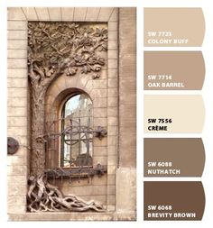 the color scheme for this house is brown and beige, with an old tree on it