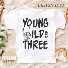 Young Wild And Three SVG is the perfect way to add a rebellious edge to your little one's Birthday wardrobe! Created by Offensive SVG, this urban and grunge-inspired design features a striking skeleton hand motif that's ideal for boys and girls. Whether you're looking to create custom shirts or accessories, this edgy SVG design is guaranteed to make a statement. Embrace the wild side with this unique and trendy urban SVG, and let your child's style stand out from the crowd! SUGGESTED USES: *Libb Svg Boys Shirts, Young Wild And Three Birthday Boy, Young Wild And Three, Young Wild And Three Birthday, Third Birthday, Decal Wall Art, Silhouette Designer Edition, Svg Design, 3rd Birthday