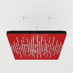 a red light hanging from the ceiling with white lines on it's sides and black trim