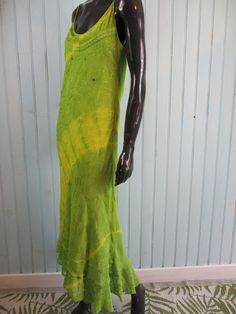 Vintage tie-dye midi dress . Lime green and yellow embroidery and sequins. It has an asymmetric hem and is fully lined Dimensions: Bust: 36 Inches. Length: 48 Inches. Made by BLUE PORT Hand Dyed Maxi Length Summer Dresses, Hand Dyed Maxi Dress For Summer, Hand Dyed Maxi Length Dresses For Summer, Hand Dyed Maxi Dress For Spring Vacation, Fitted Green Maxi Dress For Summer, Flowy Tie-dye Dress, Flowy Hand-dyed Tie-dye Dresses, Flowy Hand-dyed Tie Dye Dresses, Hand Dyed Maxi Length Dress For Festival