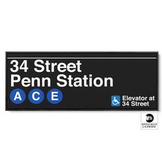 a sign for the 34th street penn station is shown in black and white with blue lettering