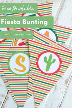 three free printable fiesta bunting banners on a white wooden table with text overlay that says free printable fiesta bunting