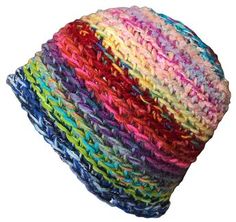 a multicolored knitted hat on a white background with clipping for text