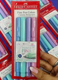 a package of fine pen colors in pink, blue, and purple with white tips