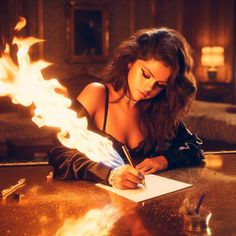 a woman sitting at a table writing on a piece of paper with flames coming out of it