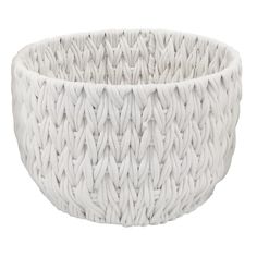 a white woven bowl on a white background