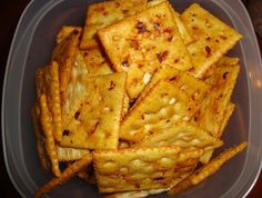 a plastic container filled with cheesy bread sticks