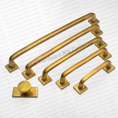 brass door handles and knobs on white background