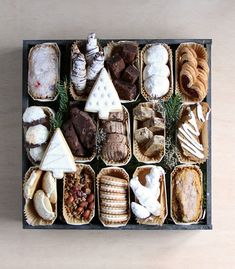 a tray filled with different types of pastries