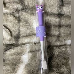 New/ Never Been Used!! This Is A Kuromi Tooth Brush With Her Head At The Top Of The Brush. The Tooth Brush Is White And Purple With Soft Bristles That Are White. Material Of The Tooth Brush Is: Silicone At The Top, White Material, Bath Accessories, Color Purple, Brushing Teeth, The Top, Bath, Purple