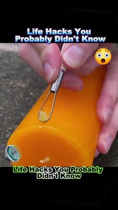 a person is holding an orange tube with a pair of scissors in it and the words life hacks you probably didn't know