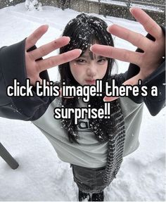 a woman with her hands up in the air while she is covered by snow and has text that reads, click this image there's a surprise