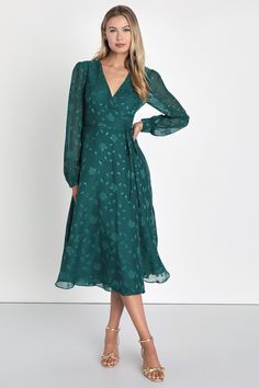 Classy and chic come together in perfect harmony to create the Lulus Evening of Elegance Emerald Green Floral Jacquard Wrap Dress! Lightweight woven fabric, with a floral jacquard pattern, shapes this fabulous dress that has a surplice neckline and sheer long sleeves with button cuffs. Adjustable wrap silhouette, with tying waist sash and hidden internal ties, ends at a slightly ruffled midi hem. Fit: This garment fits true to size. Length: Mid-calf length. Size medium measures 46" from shoulder Winter Wedding Guest Dress, Emerald Green Dresses, Waist Sash, Fall Wedding Guest Dress, Long Sleeve Wrap Dress, Surplice Neckline, Wrap Midi Dress, Floral Jacquard, Fabulous Dresses