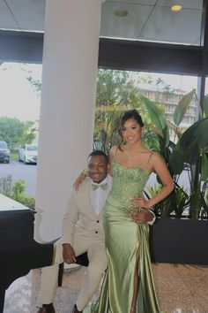 Green Prom Date Outfits, Princess And Frog Prom Dress, Sage Green Prom Outfits For Couples, Hollywood Prom Theme Outfit, Lime Green Prom Couple, Pine Green Prom Dress, Yellow Prom Dress With Date, Green Prom Black Couple, Light Green Prom Dress Couple