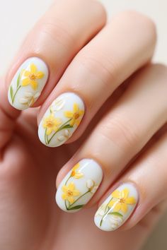 Capture the essence of spring with these lovely daffodil-inspired floral nail designs. Soft white and yellow hues create a serene yet vibrant look. Perfect for adding a subtle touch of nature to your style. Explore more at NailHow.com! Nail Designs Soft, Daffodil Nails, Nail Desi, Silk Wrap Nails, Gel Nails French, Natural Nail Care