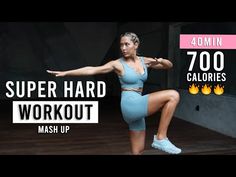 a woman in blue sports bra top and leggings doing a dance move with the words super hard workout mas up