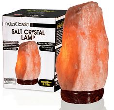 the himalayan salt lamp is in its box and ready to be used as a decoration